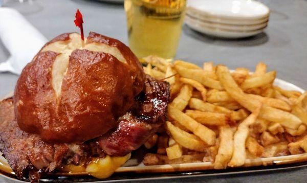 Mac & cheese brisket on pretzel roll