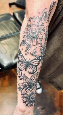 Lower arm half sleeve.. flowers and butterflies. By tattoo artist Jay Boss.