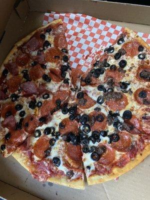 16 inch thin crust pizza olives, pepperoni, canadian bacon and ham