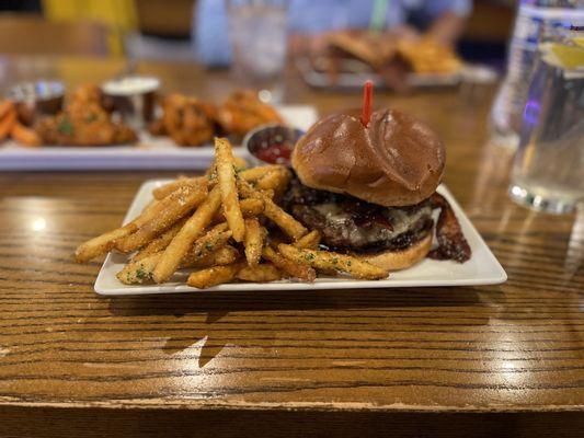 Western cheeseburger with bacon and Parmesan cheese fries