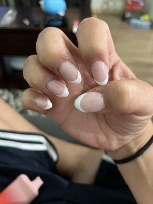 Uneven white tips, no effort put into these nails.