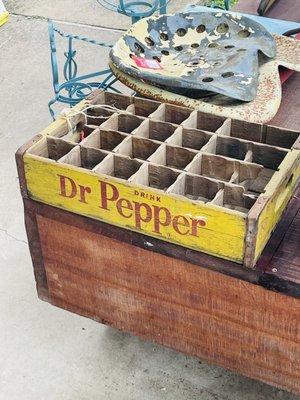 Tractor seat and Dr Pepper bottle delivery crate