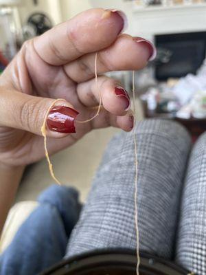 Long thread found baked within my food