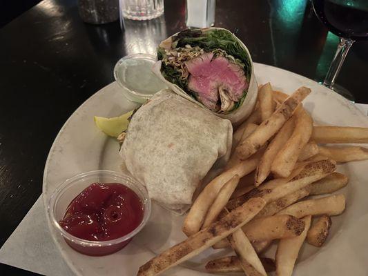 Asian Tuna wrap with a side of ranch fries, cooked perfectly, but very salty