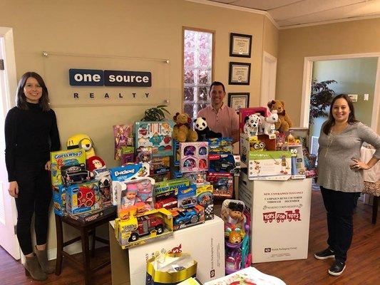 A special thanks to our generous guests at last Saturday's Client Appreciation party. We filled up three boxes for Toys for Tots!!