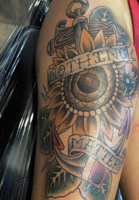 By Jaycob. I wanted an anchor, sunflower & "nothing matters" This is what he created  he freehanded the bumble bee