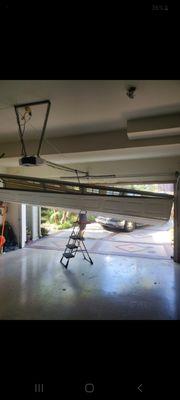 Garage door fell off tracks contact us to get professional same day repair