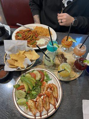 Complimentary Chips, Salsa & Beans. Camarones Al Mojo De Ajo Appetizer. Pollo A La Mexicana.  Margarita Flight with 6 Flavors.