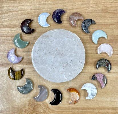 Gemstone carvings, crescent moons.