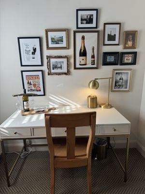 Room desk with pictures of Renault Wines