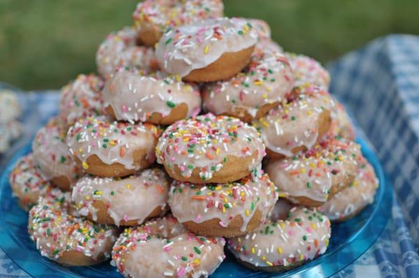 Donut stack at my daughter's 2nd birthday instead of cupcakes. Best idea EVER. Best rainbow sprinkled donuts in town