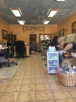 Tracy is the first woman in the black blouse and my pedicurist is in the back with the green blouse