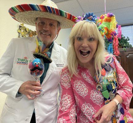 Dr. Dutson and Kristi say Viva Fiesta from Thrive Head and Spinal Care