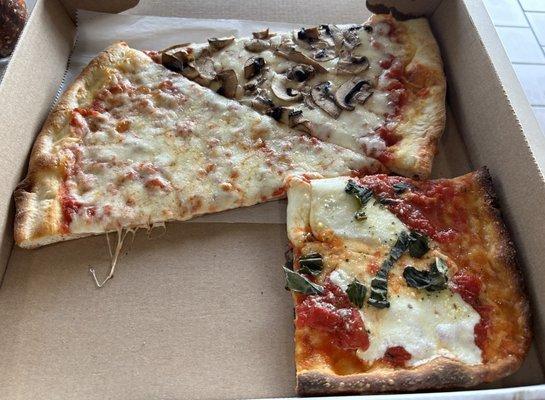 Brooklyn slice - delicious.  Plain and shroom are above average. Good place to get a slice in my opinion.