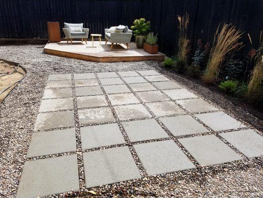 Modern touch to an outdoor landscape, using 24X24 paver slabs