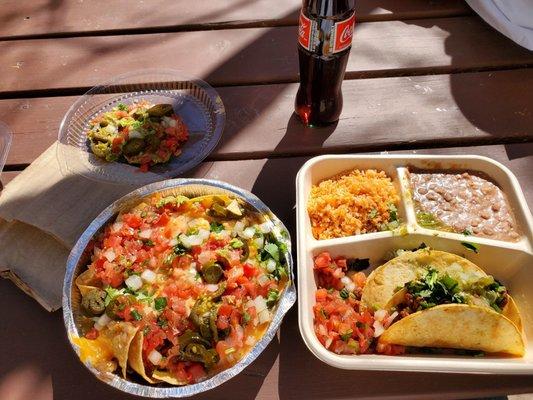 Vegetarian nachos and Beyond beef hard-shell tacos