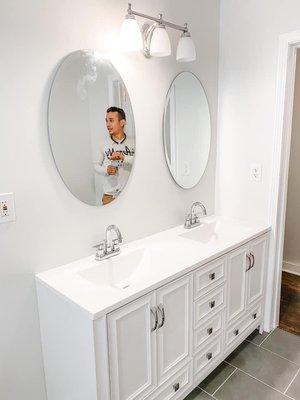 Stunning all white vanity with gold accents.