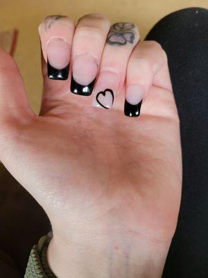 Uneven, and poorly done French tips and heart