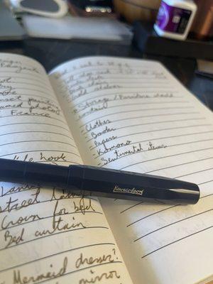 Kaweco Sport fountain pen in dark blue, and journal with Kaweco Caramel Brown ink for an idea list