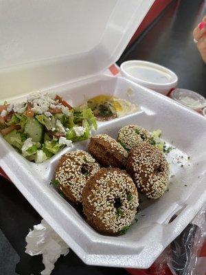 Falafel plate with the neat looking falafel rounds.