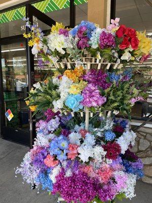 The plastic flowers displayed outside were irresistible to my eldest; had to pry her away eventually so we could complete our errands. Lol