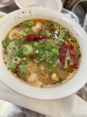 Spicy herbal soup (Tom sap)