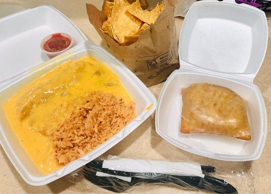 2 cheese enchiladas, rice, chips, salsa, & sopapilla.