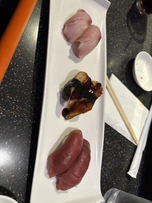 (Top to bottom) hamachi, Unagi, and toro nigiri