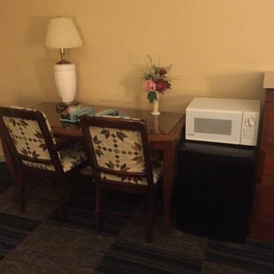 Desk with mini fridge and microwave