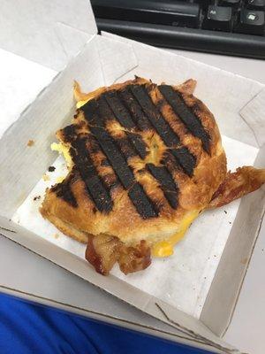 Burnt breakfast sandwich after asking for the breakfast combo with a hash brown and being told that hash browns take 20 minutes to make.