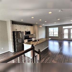 This is the kitchen right before we moved out and my made the island into a beautiful breakfast bar which my son would sit on all day!