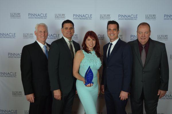 Nicole Grey takes Diamond Club Award for Top 2% Company Wide Real Estate Sales 2016!  Pictured with Owners Dana, Carl, Danny & Jeff.