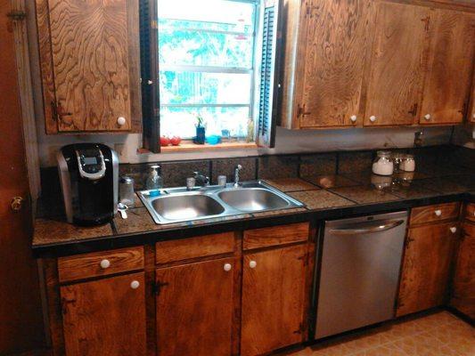 Custom countertop & refinish cabinets.