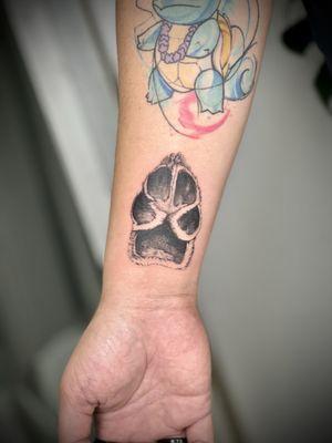 Paw print done by @bigheadtattoo