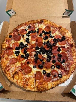 Pepperoni and black olive large pizza