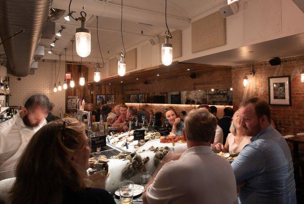 A relaxed, casual raw bar atmosphere.