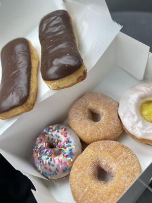 Chocolate bar, sugar donut, sprinkle donut, & lemon filled glazed donut