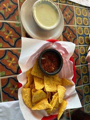 Chips and queso.  Queso is a bit runny but with a good flavor with a back spice that hits after you eat it