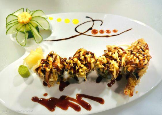 President roll. Shrimp tempura crabmeat avocado top with spicy crabmeat eel sauce &spicy mayo