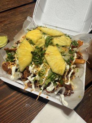 Fries with al pastor and asada