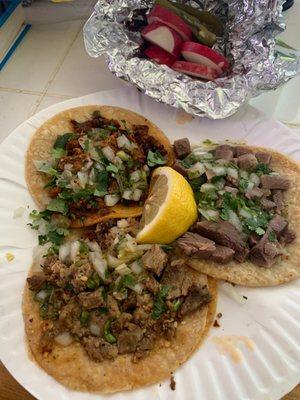 Carne asada, chorizo, and lengua tacos.