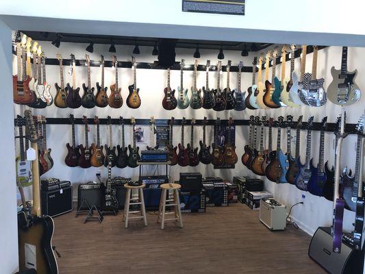 Main electric guitar room. Not as big a selection as Guitar Center but impressive choices of what they carry.