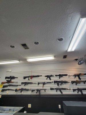 The selection of rifles and shotguns available at the new Stone Mountain Pawn & Gun Shop.