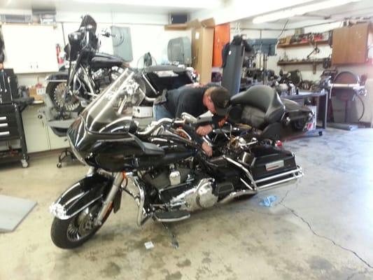 Nathan working on my Road Glide