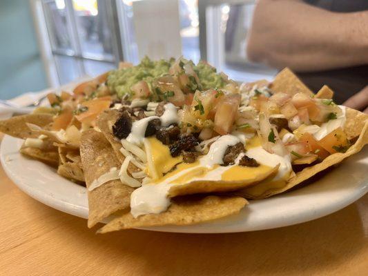 1/2 carne asada chips and 1/2 carne asada fries