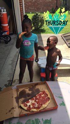 Logan & Lauryn love the pizza!