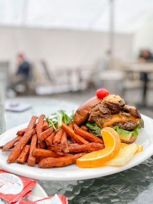 Burger with pulled pork and sweet potato fries