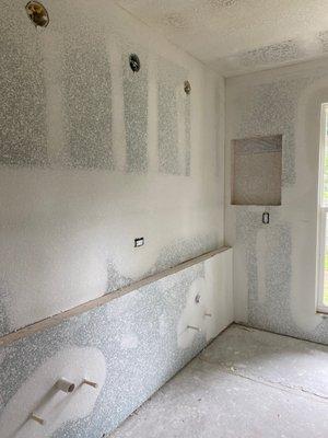 Drywall installed in bathroom