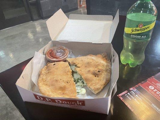 Calzones as it's served with a 20 Oz Drink.