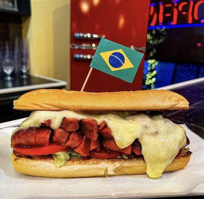 Our signature Bossa Nova sandwich made of linguica, Brazilian vinaigrette, mozzarella on a grinder roll.